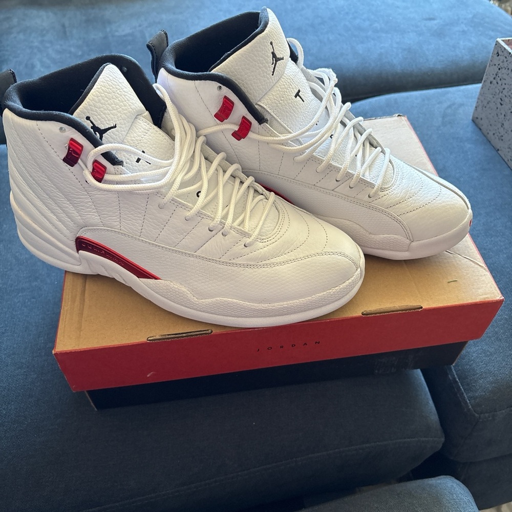 Jordan, size 10 in men’s, and white and red